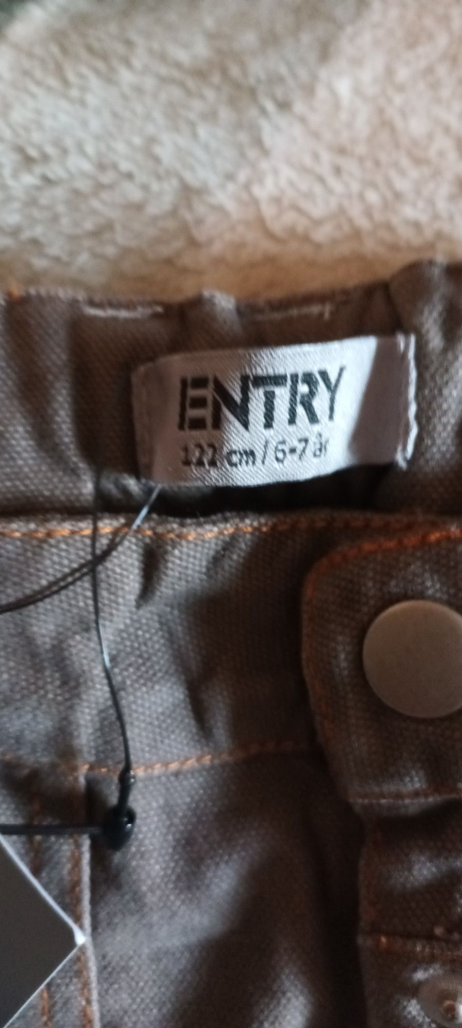 Spodnie brązowe z kieszeniami roz.. 122