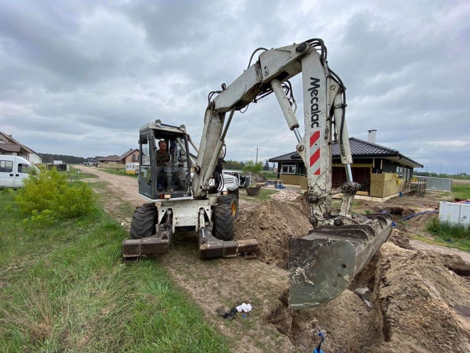 Usługi koparka kołową Mecalac 12 MSX