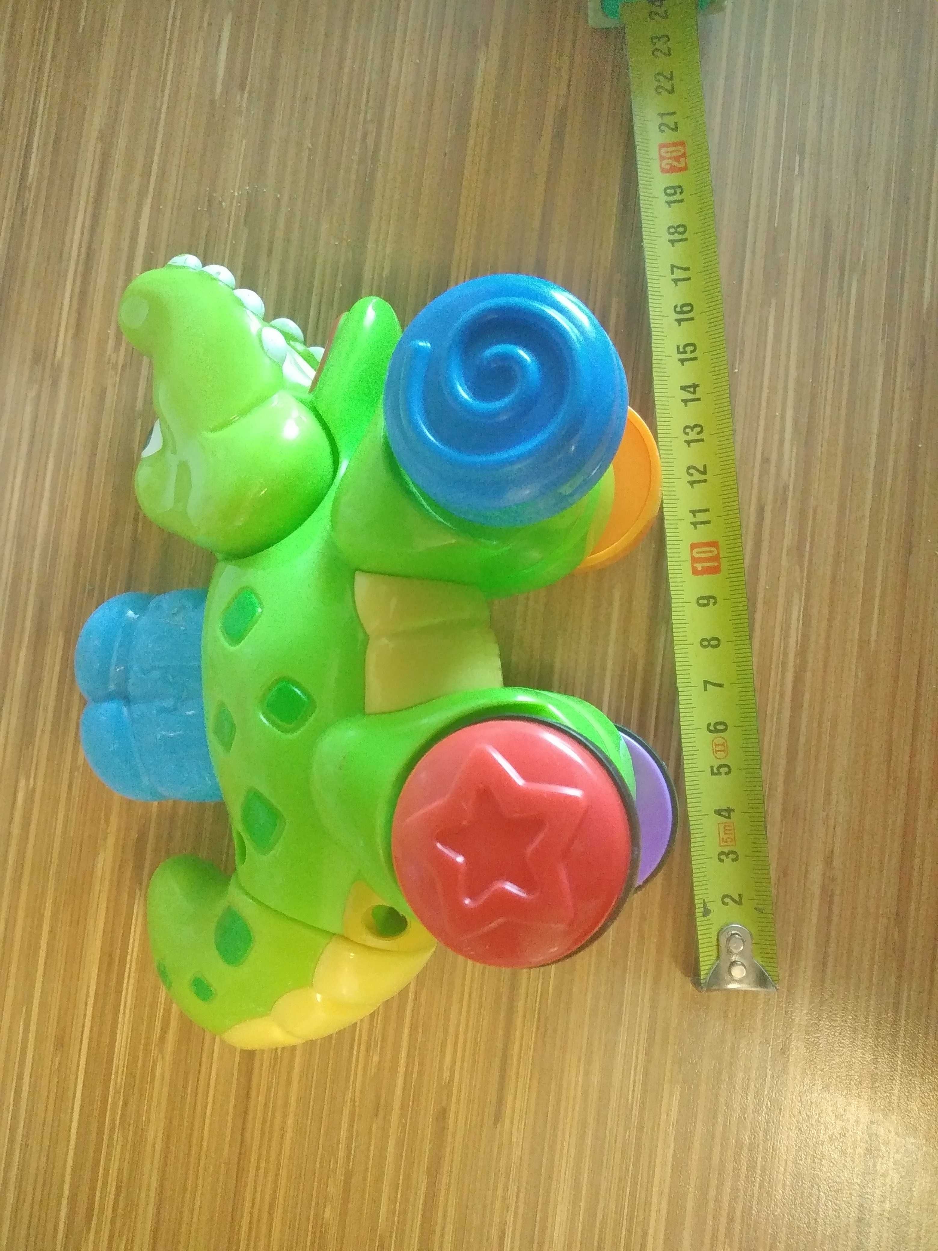 Zabawka fisher price krokodyl na kolkach nacisnij i jedz