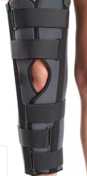 Тутор (фіксатор) на колінний суглоб.