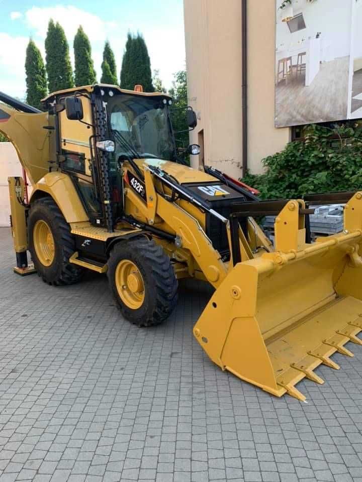 usługi koparką kołową cat M313d roboty ziemne koparka wykopy błotniak