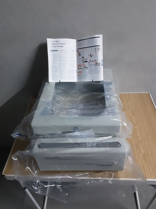 Massajador de pés novo.