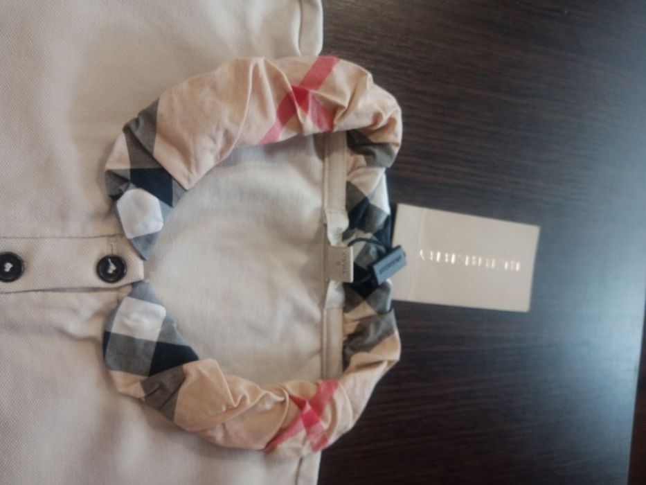 Продам фірмове жіноче поло