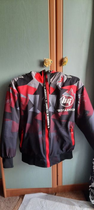 Продам двосторонню дитячу куртку