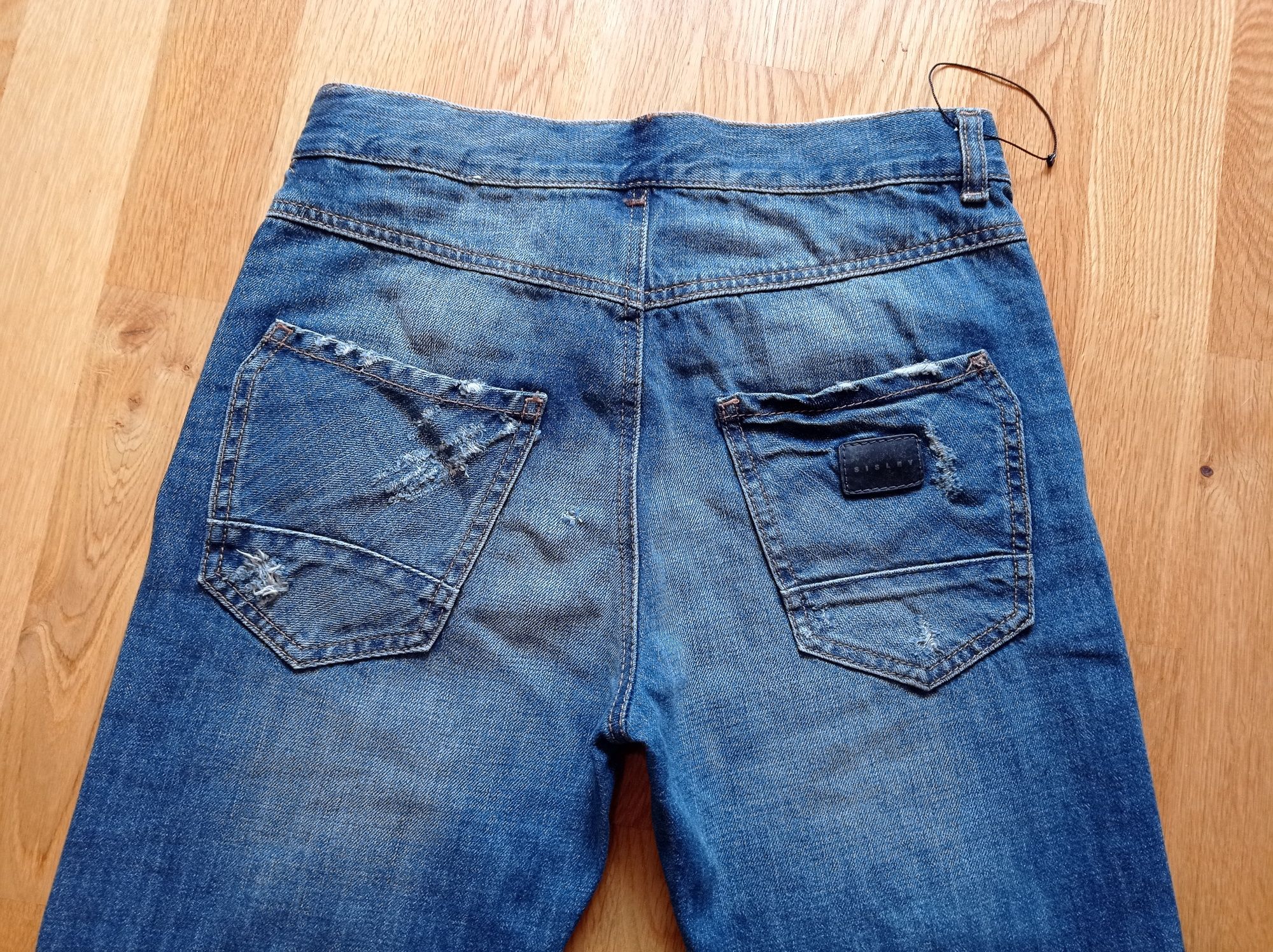 Sisley Bronx loose fit jeansy przecierane z dziurami, r. W25 L30