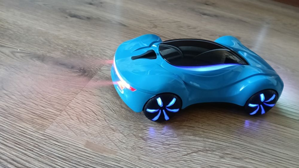 Новинка 2025.іграшка спортивна машинка на пульті  4wd  дим музика дриф