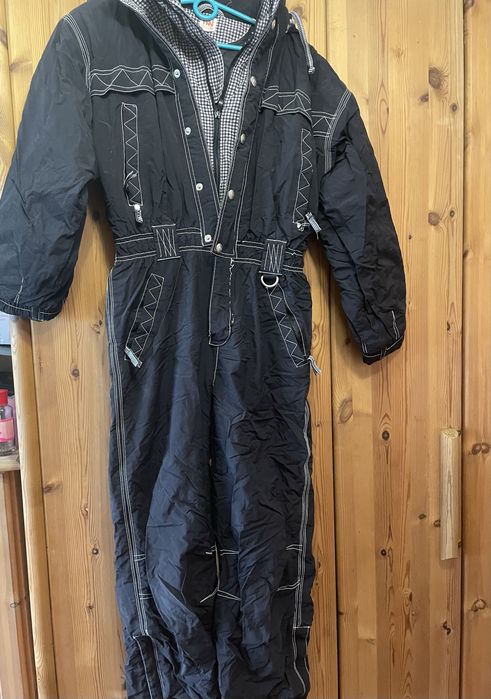 Жіночі теплі комбінезони