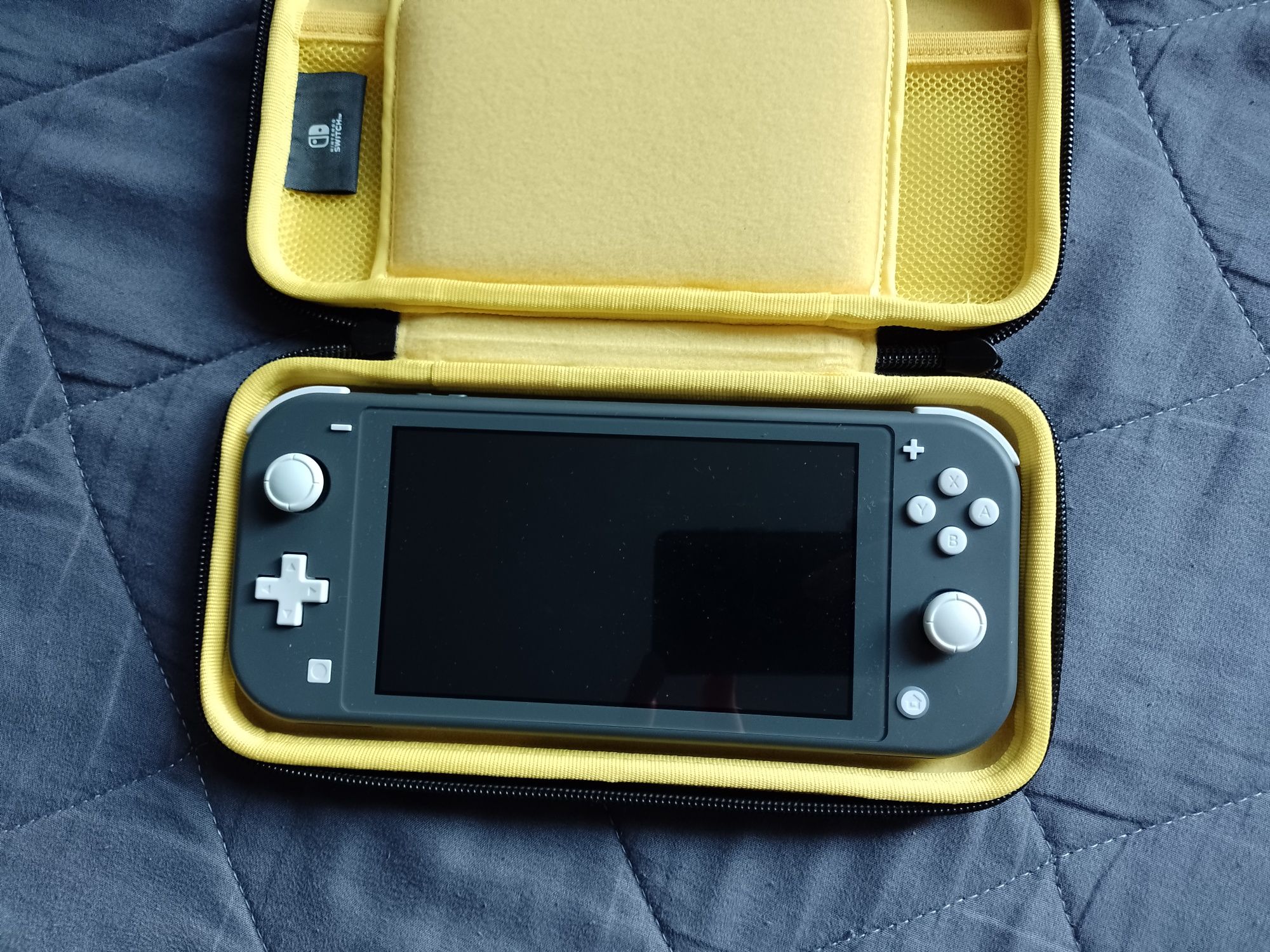 Nintendo switch Lite +2 gry