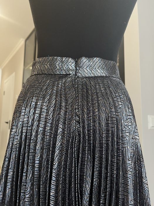 Спідниця міді з плесіровкою