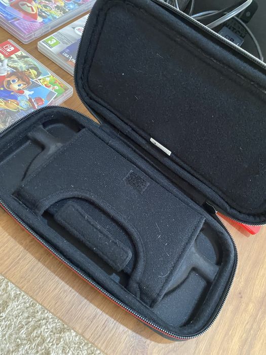 Nitendo Switch em otimo estado com jogos bolsa e acessorios