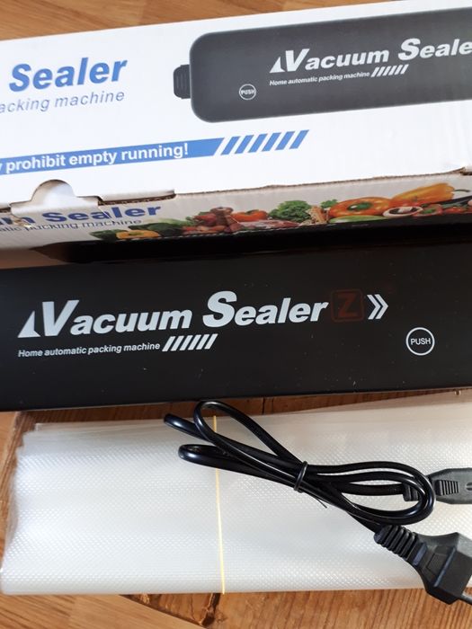 Побутовий вакуумний пакувальник