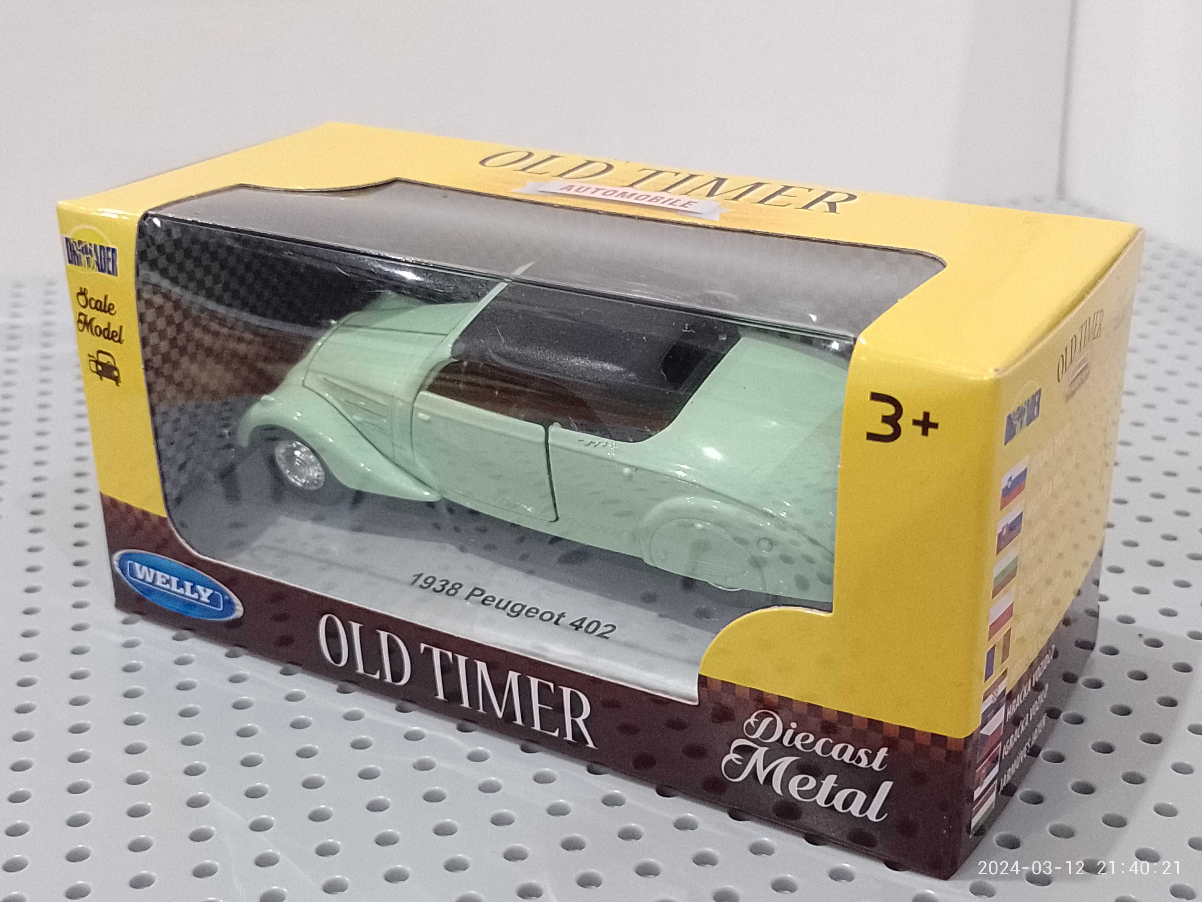 PEUGEOT 402 NOWY model auta WELLY skala 1:32 (1938 rok)