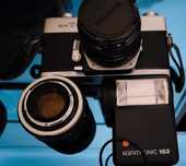 Minolta, flash e duas objectivas. Anos 70, em muito bom estado.