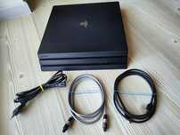 PlayStation 4 Pro z dyskiem SSD + Razer Raiju