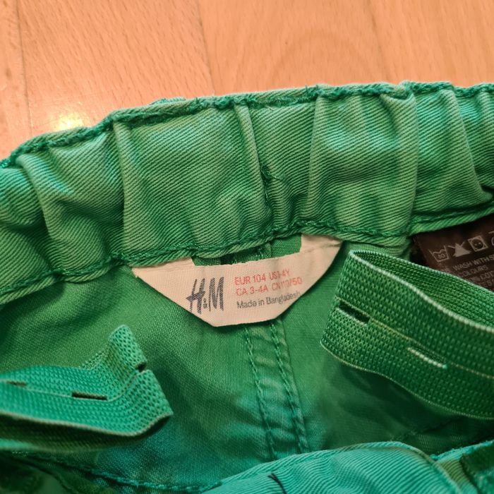 Spodnie zielone jeansy H&M 104