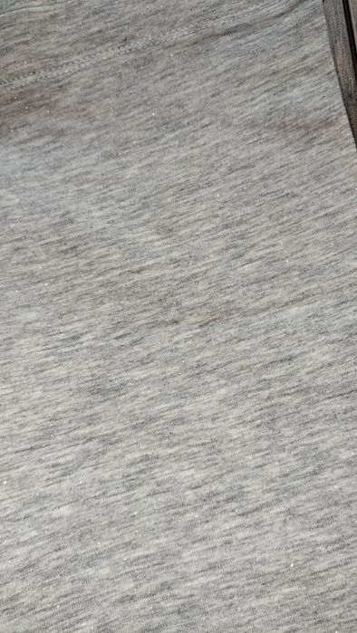 Legginsy 134/140 stan idealny jak nowe srebrna nitka