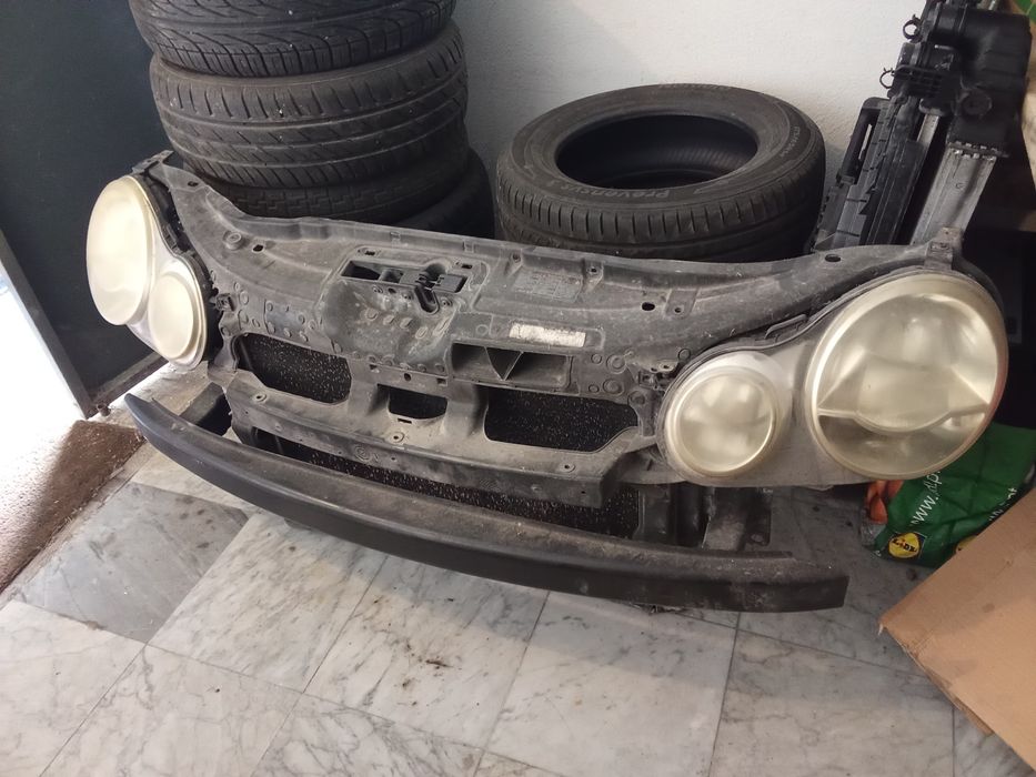 Farol polo 2004 e radiador