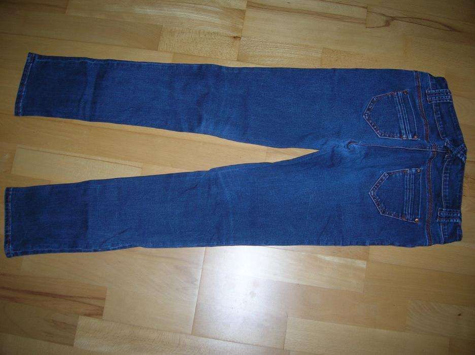 jak nowe spodnie jeans granatowy eleganckie