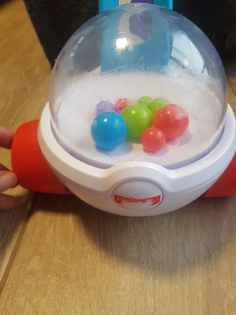 Pchacz/ jeździk Fisher Price z kulkami