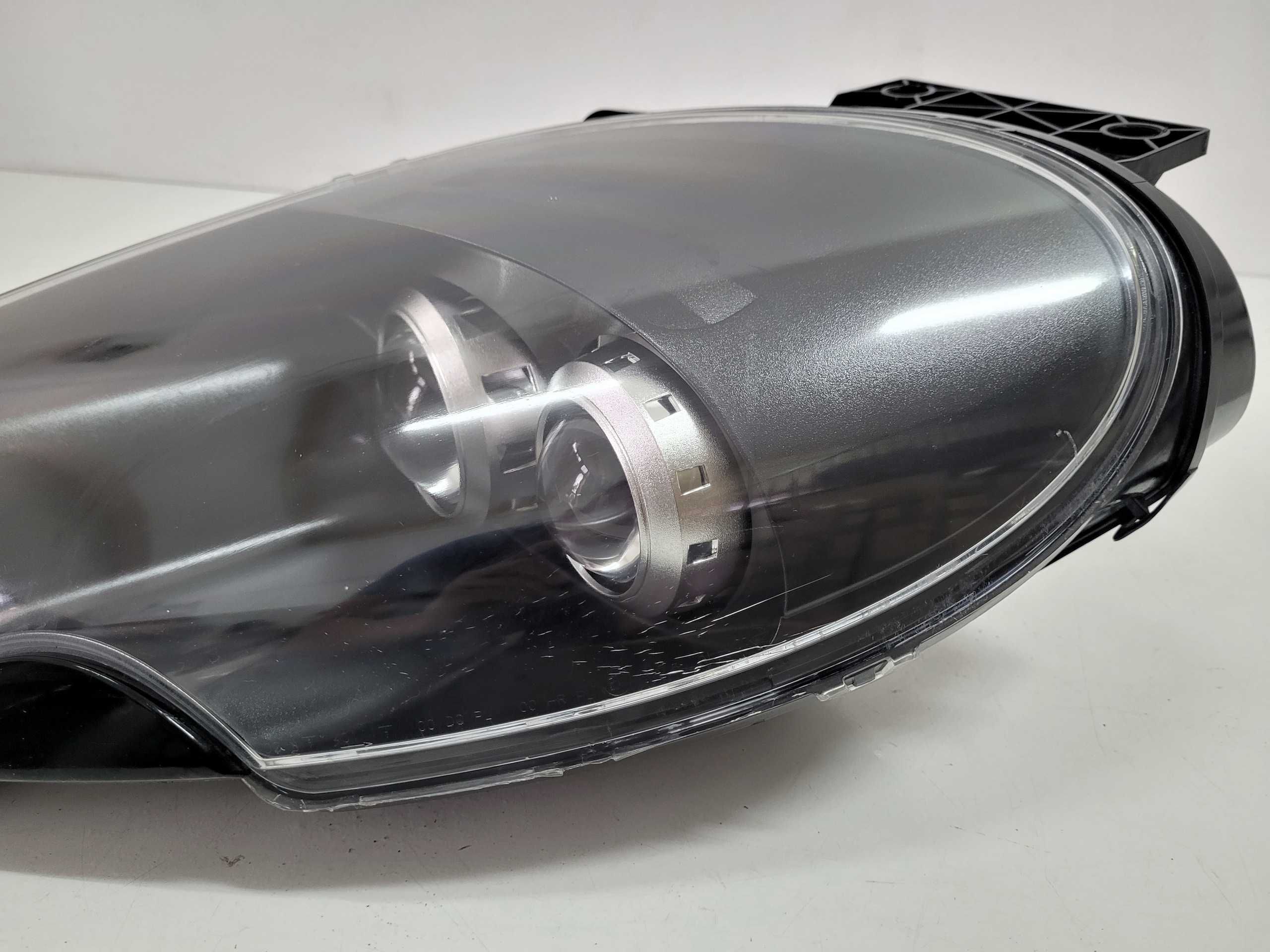 Aston Martin DB9 (04-12), DBS V12 - lampa przednia PRZÓD - LEWA