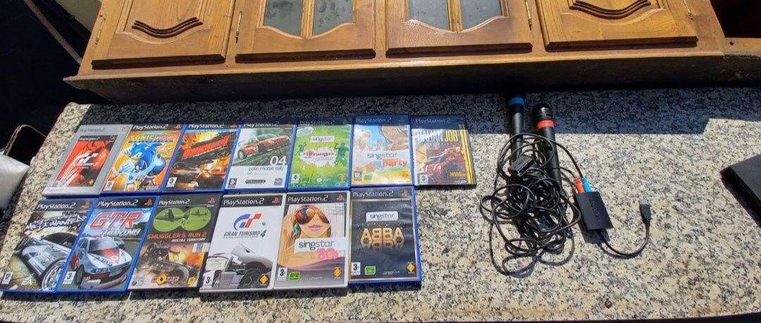 Jogos playstation 2 e sistema karaoke