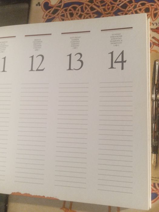 Agenda e caneta da Parker com postal duas revistas de oferta