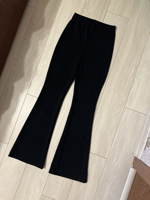 Брюки кльош чорні