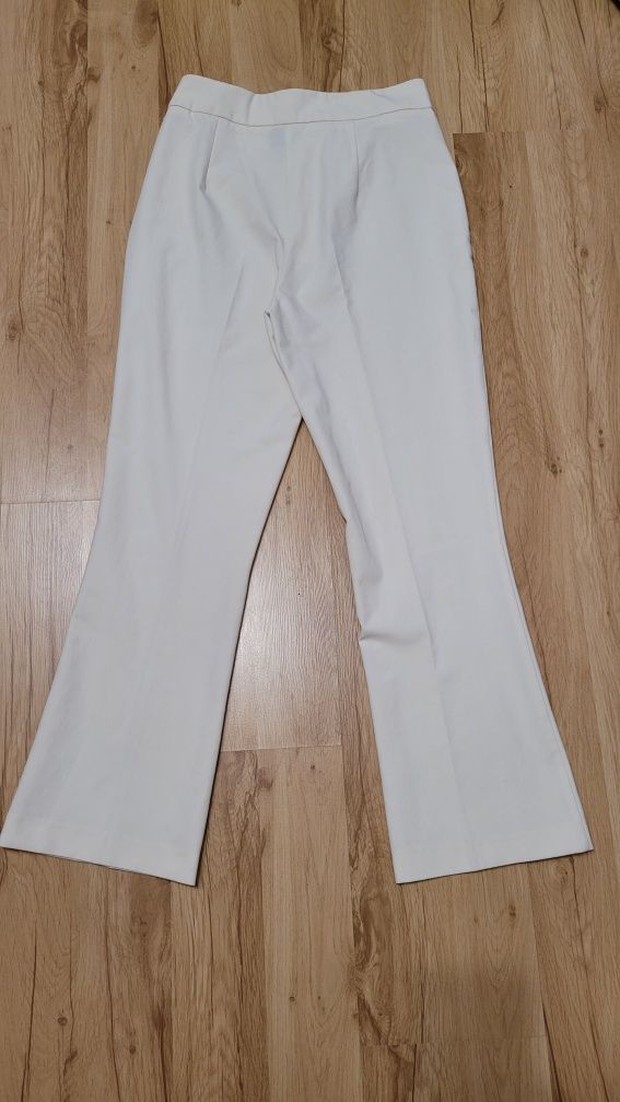 Kremowe spodnie białe flare rozszerzane dzwony Vero Moda S