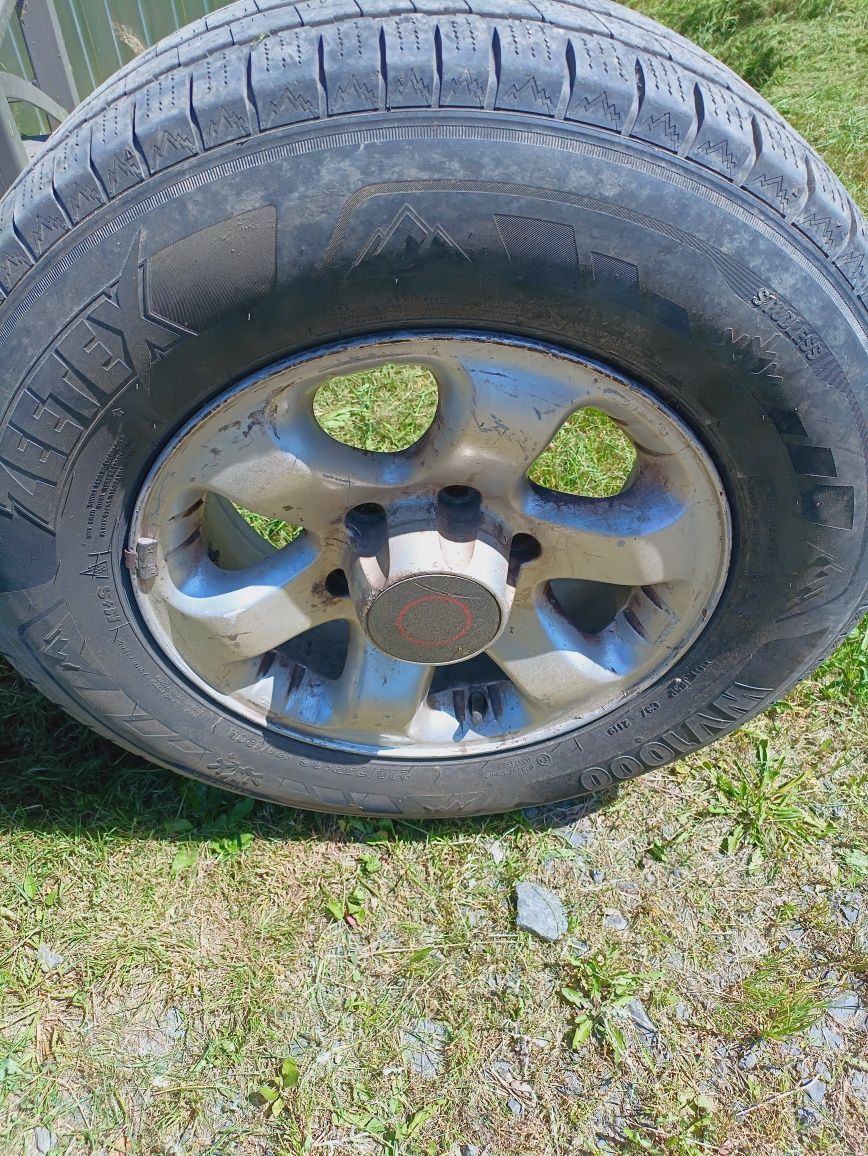 Alu felgi z oponami zimowymi Opel Frontera B