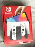 Nintendo Switch OLED (como nova) + jogos
