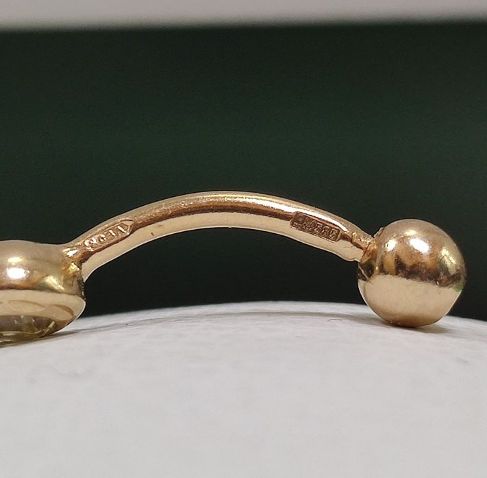 Пирсинг для пупка золото