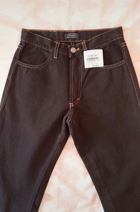 Calças de ganga pretas boca de sino 32