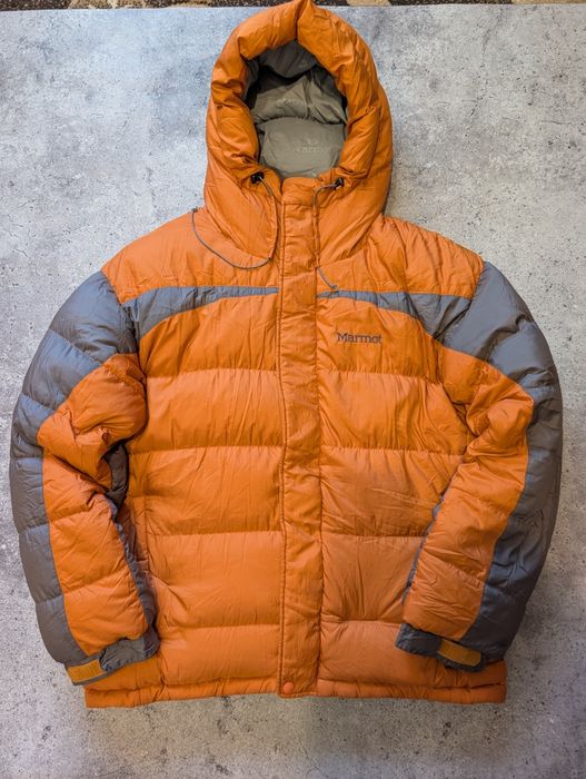 Дутий пуховик marmot