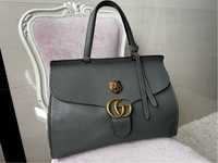 Gucci handbag like Molly Novak