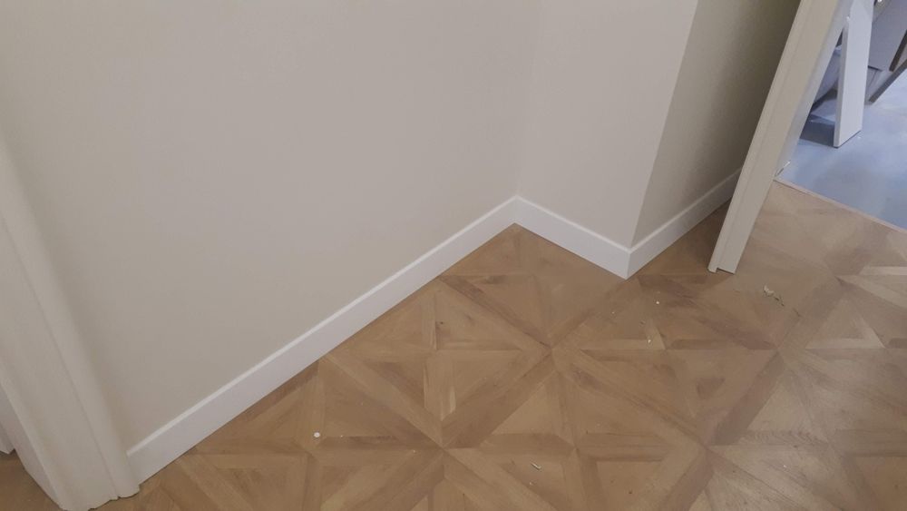 Професійний монтаж плінтуса, укладка дамінату , паркетноі дошки