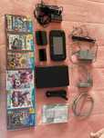 Wii U - Consola, 2 comandos, acessórios e 6 jogos