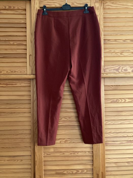 Rewelacyjne nowe eleganckie ceglaste pomaranczowe spodnie chinosy r.42