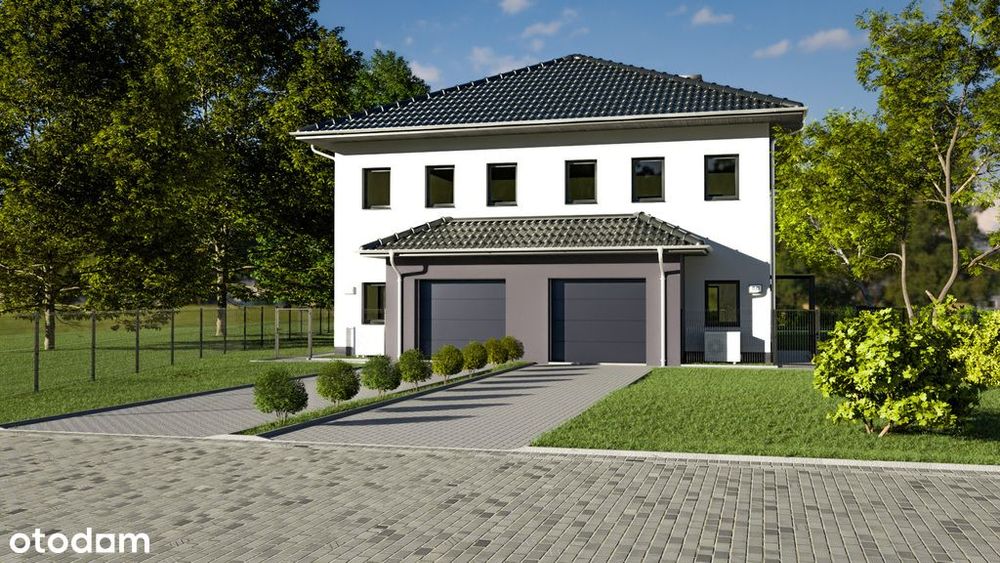 Wyjątkowy bliżniak w otoczeniu lasu.