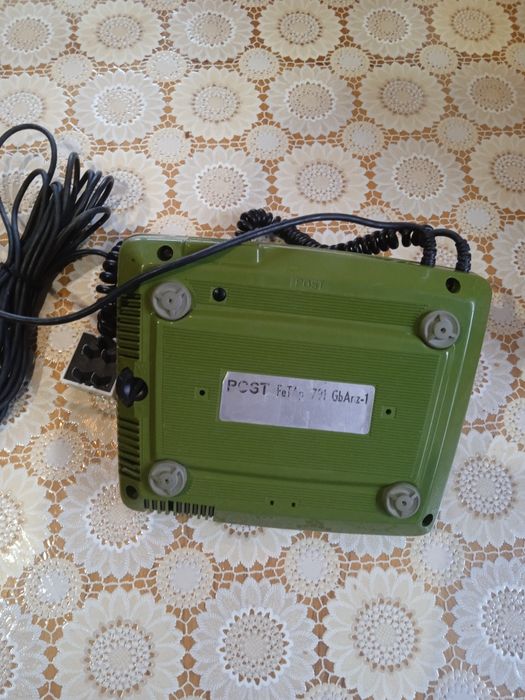 Телефон стаціонарний,дисковий.