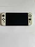 Nintendo oled białe z szybką ochronną,stacją ładującą i casem