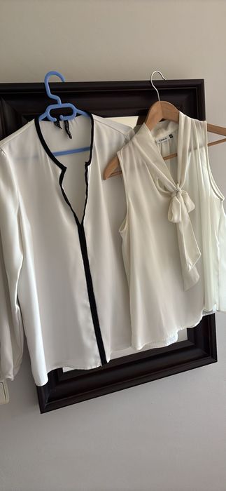 Blusas pretas e blusas brancas