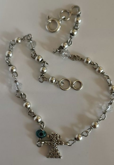 Pulseira em prata menina e olho gordo