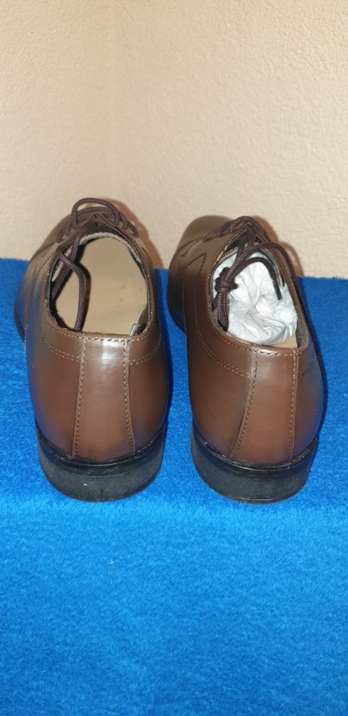 404. Christian Laurier buty pantofle skórzane