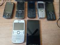 Tablet telefony komórkowe i telefon stacjonarny