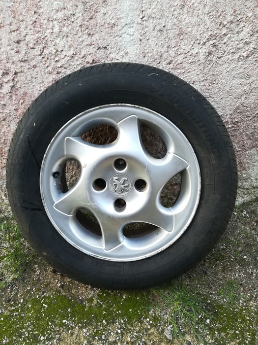 Vendo jante 15 peugeot 4x108 pneu novo195/65/15