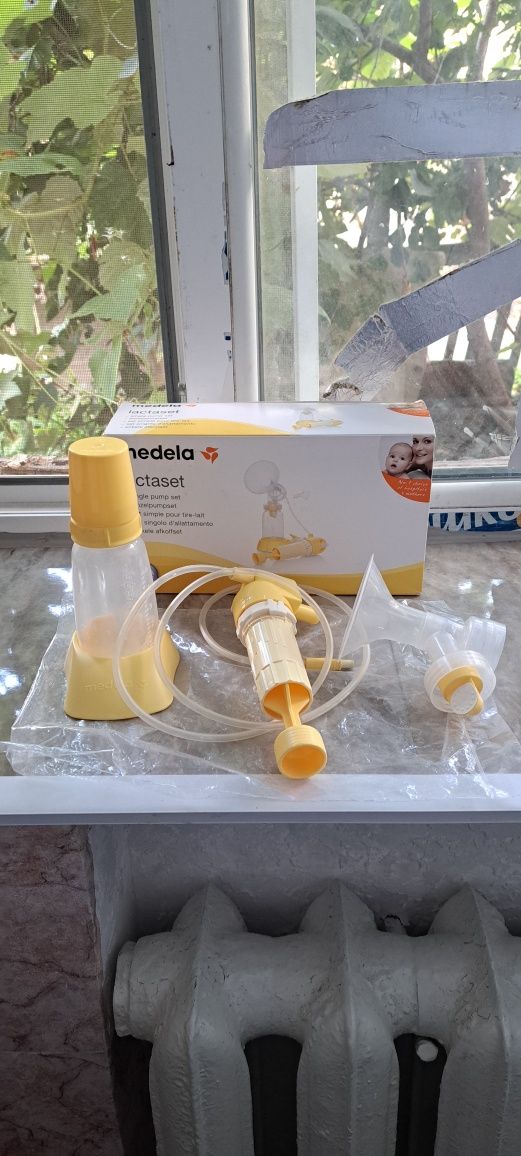 Молокоотсос Medela