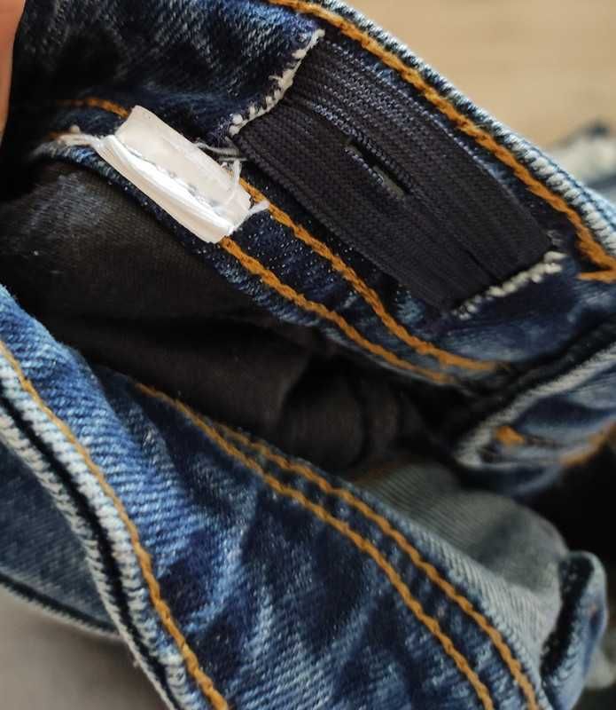 granatowe spodnie jeansowe reserved 140