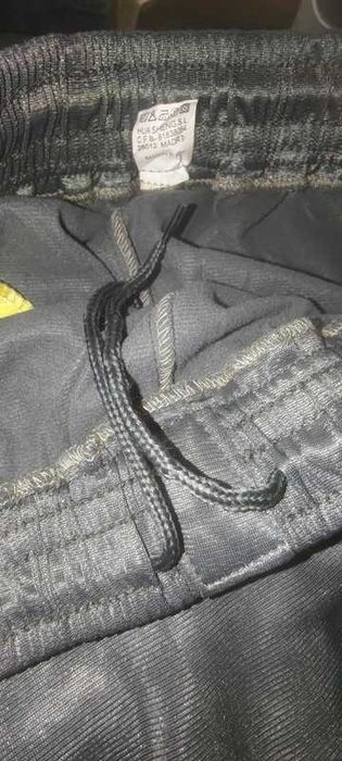 calça fato treino cinza