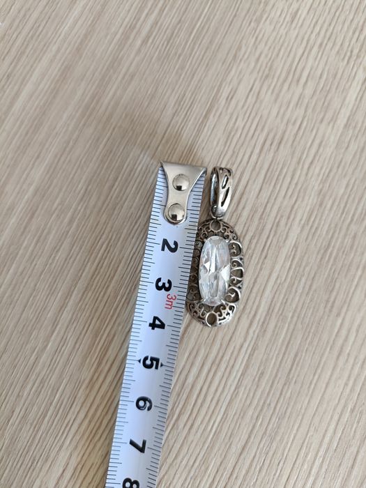 Srebrny ażurowy wisiorek