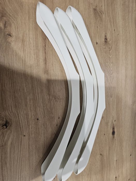 Trzy nakładki na wieszak